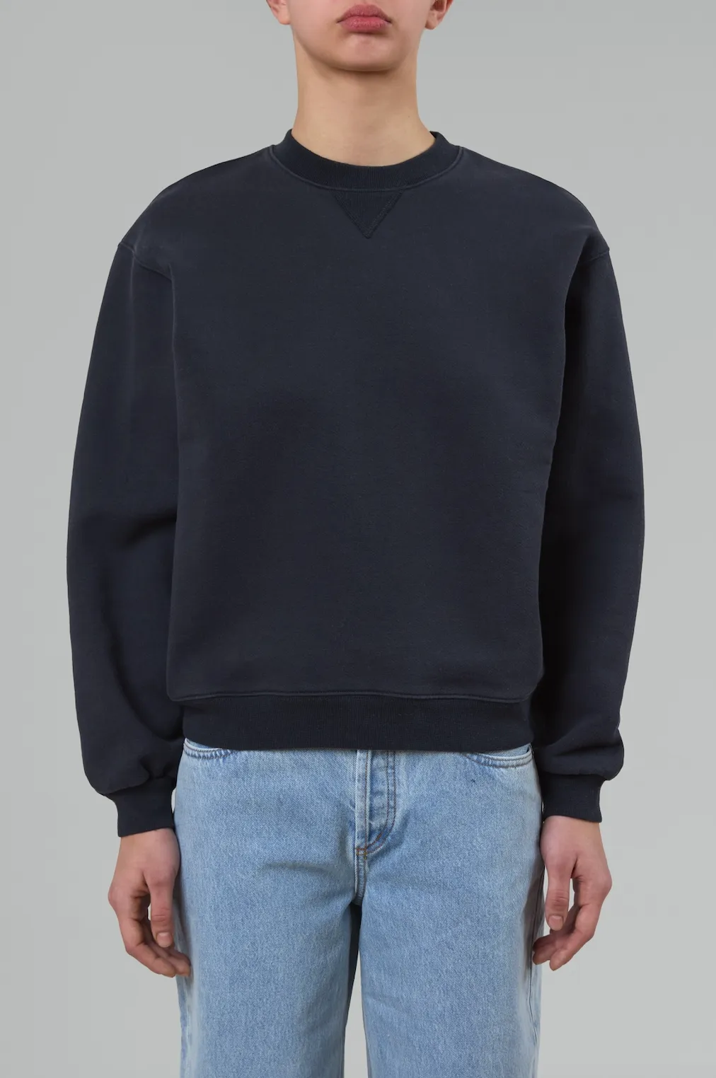 The Sweatshirt in Black sold by Still Here