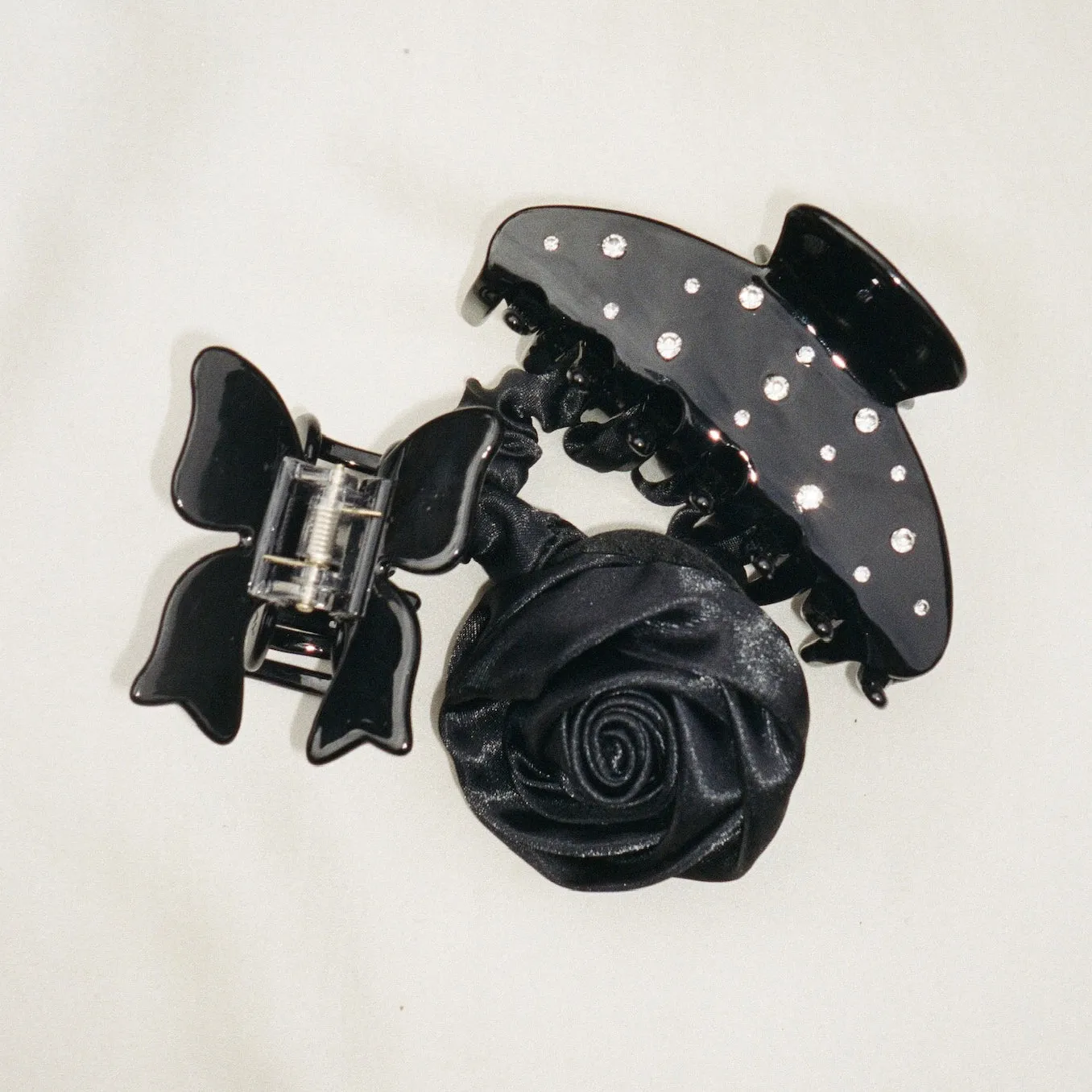 Rosette Scrunchie in Noir sold by Emi Jay product image thumbnail 2