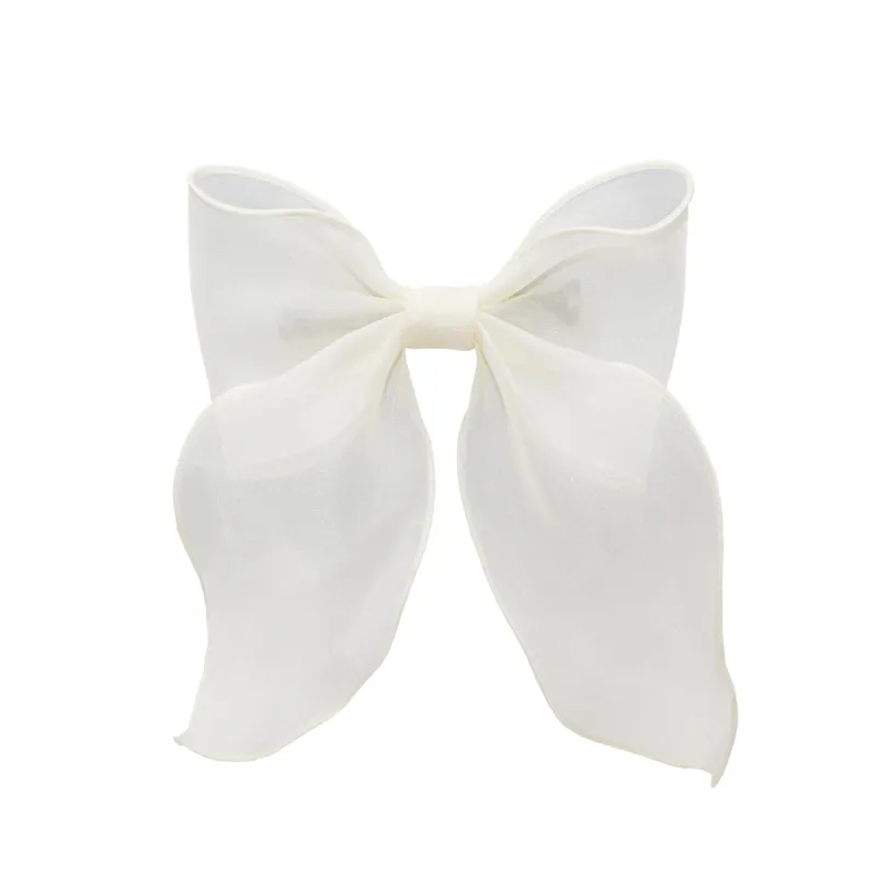 Bow Barrette in Oyster sold by Emi Jay