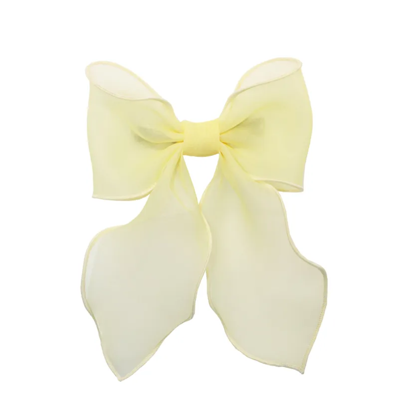 Bow Barrette in Pale Yellow sold by Emi Jay