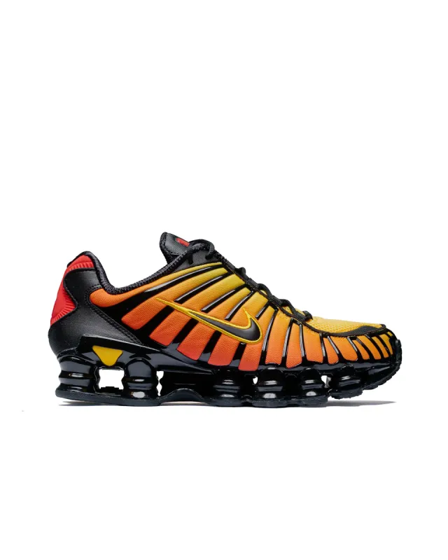 Nike Shox TL Black/Amarillo/University Red sold by Lost & Found