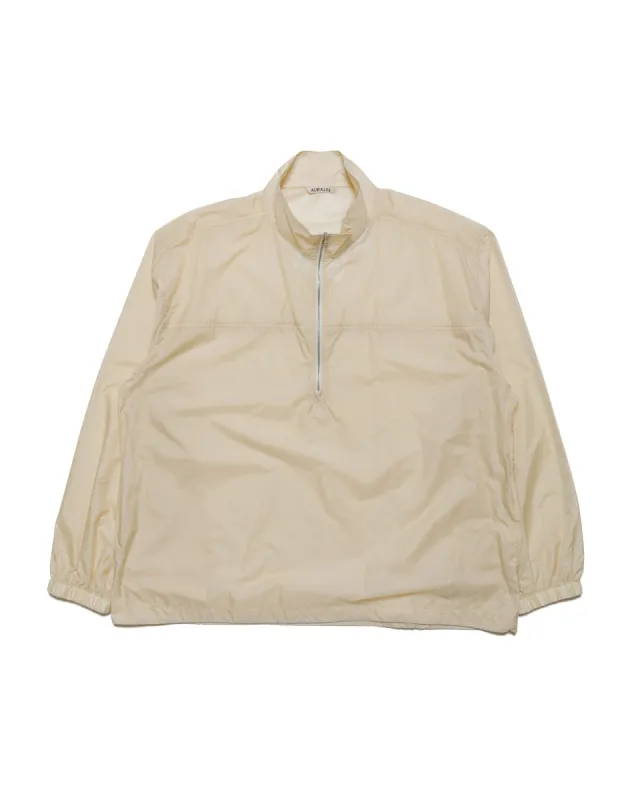 Auralee Light Nylon Half Zip Pullover Light Yellow sold by Lost & Found