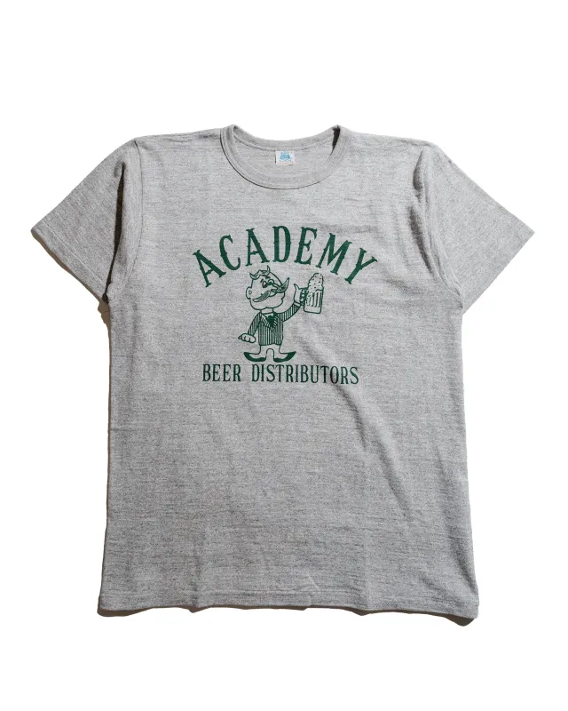 Warehouse Lot. JG-CS06 Academy Beer Distributors T Heather Grey sold by Lost & Found