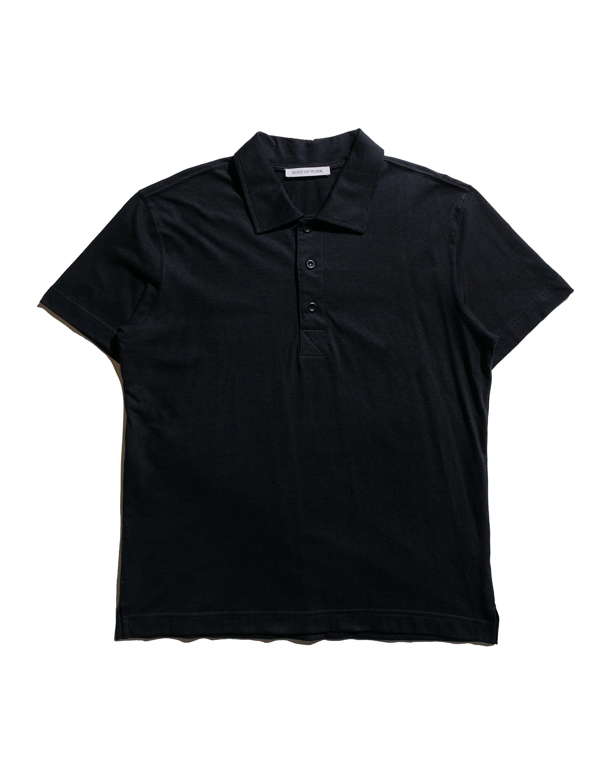 Body of Work Opal Short Sleeve Polo Black sold by Lost & Found