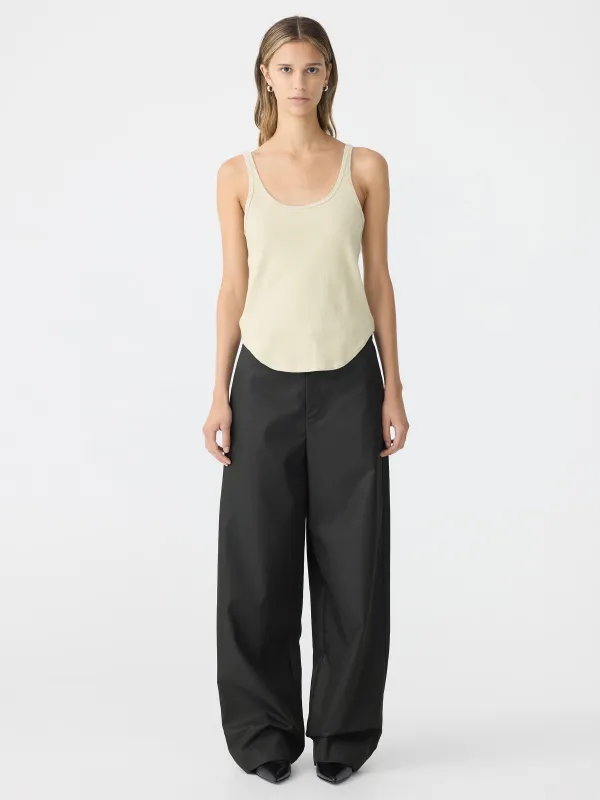 Slim Scoop Rib Tank sold by Bassike