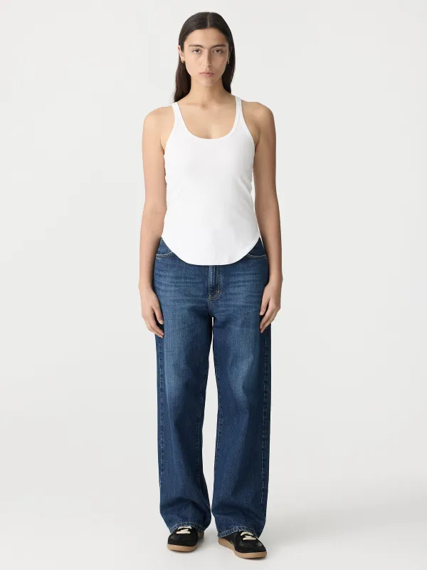 Slim Scoop Rib Tank sold by Bassike