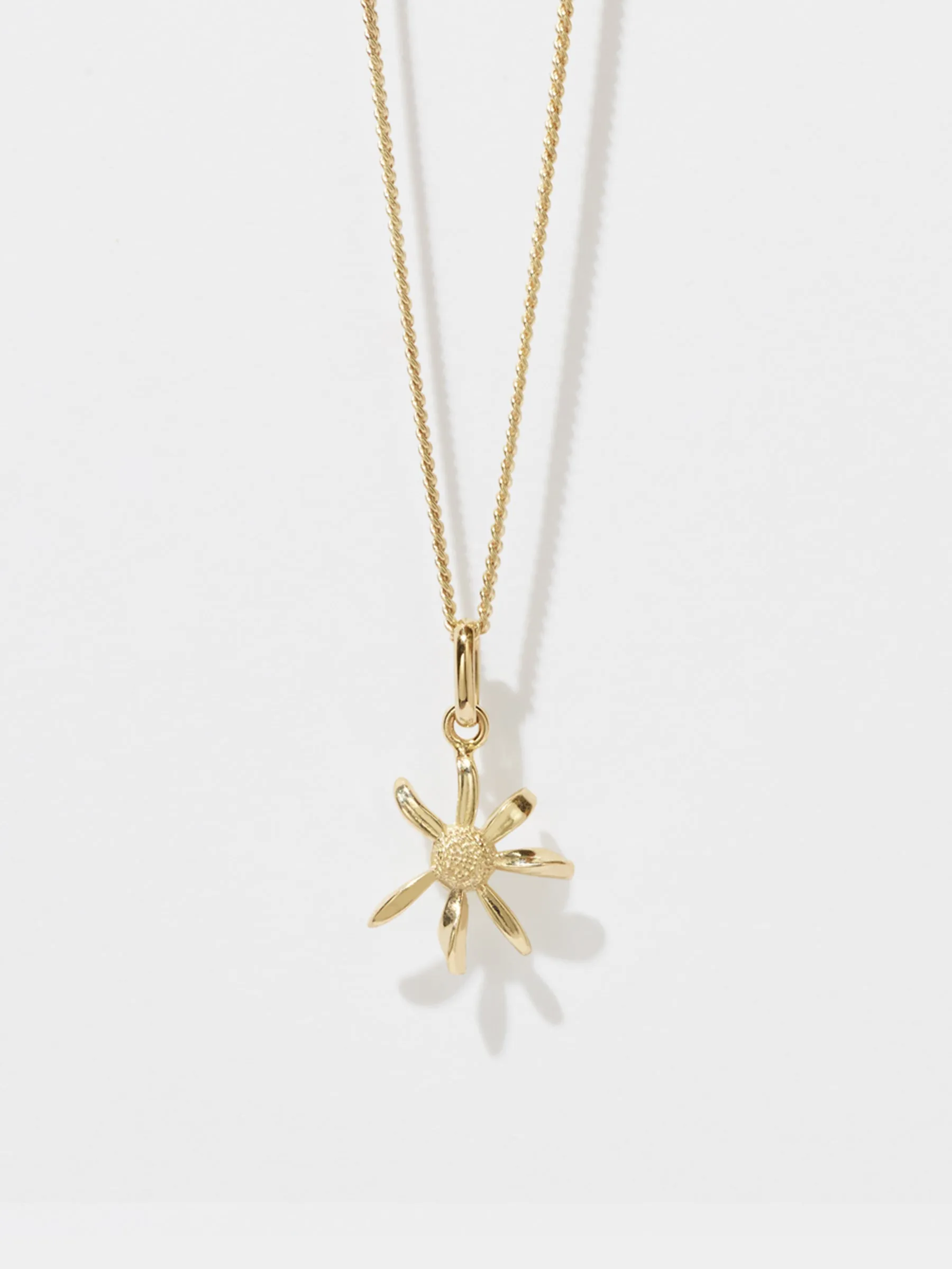 meadowlark daisy charm necklace sold by Bassike