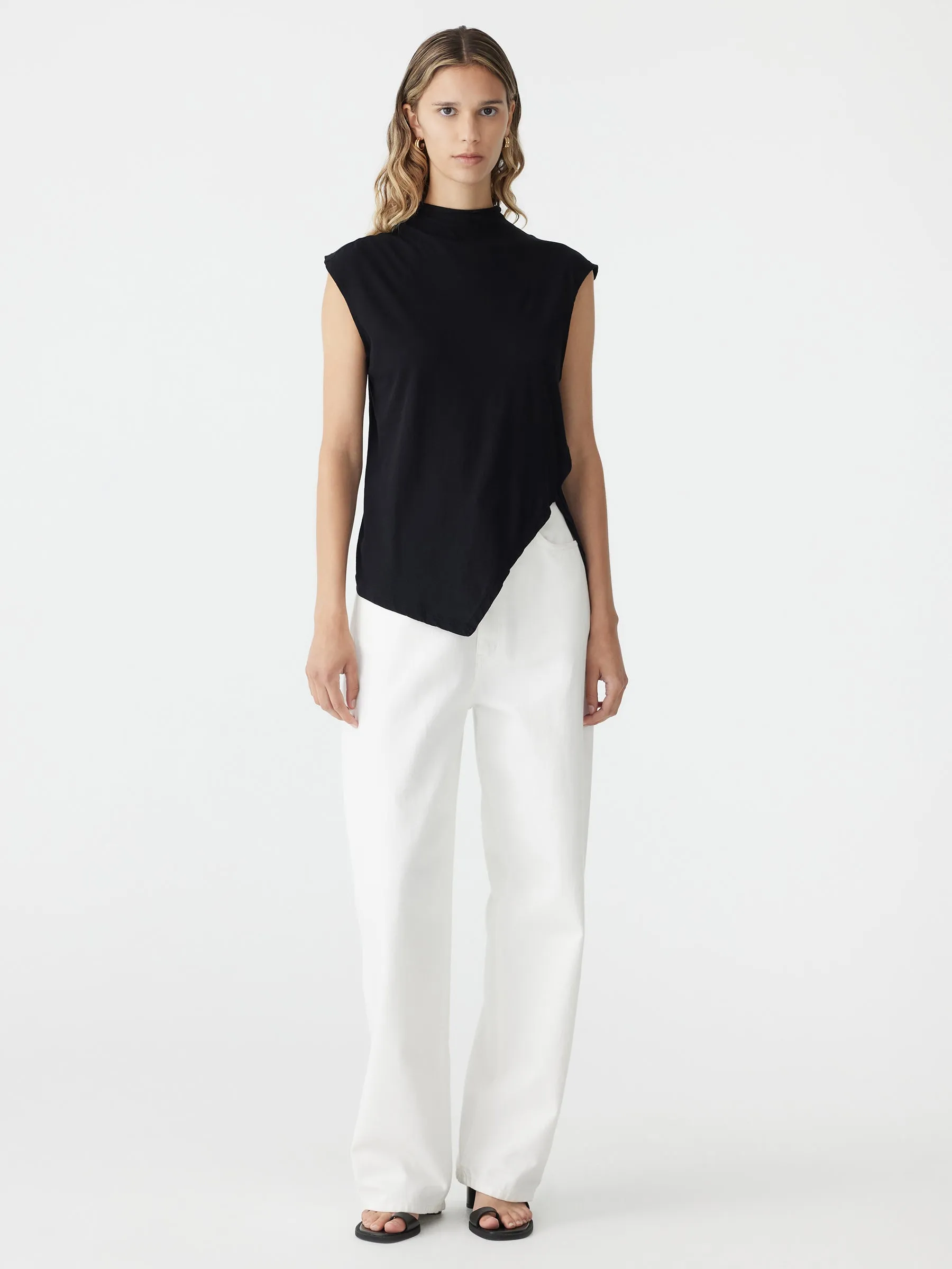 Asymmetric Raised Neck Tank sold by Bassike