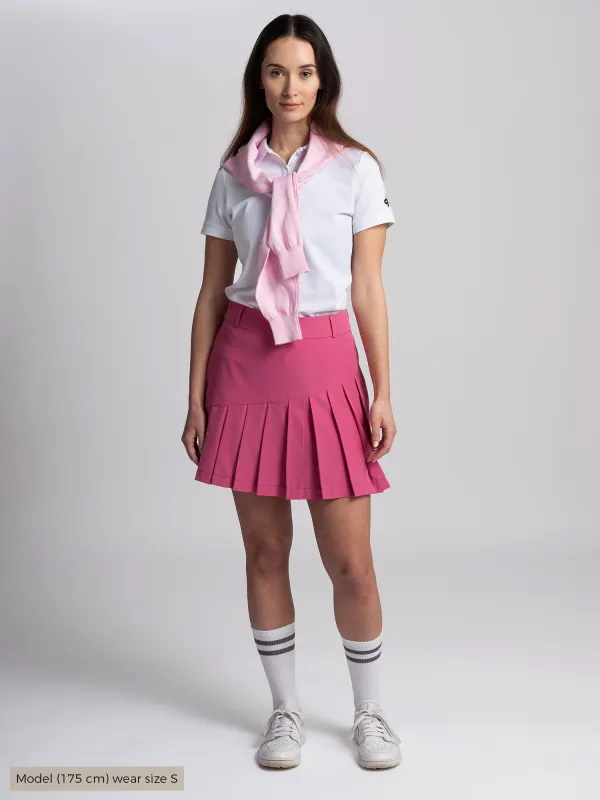 W SOLID PLEAT SKORT Raspberry Rose sold by Cross Sportswear