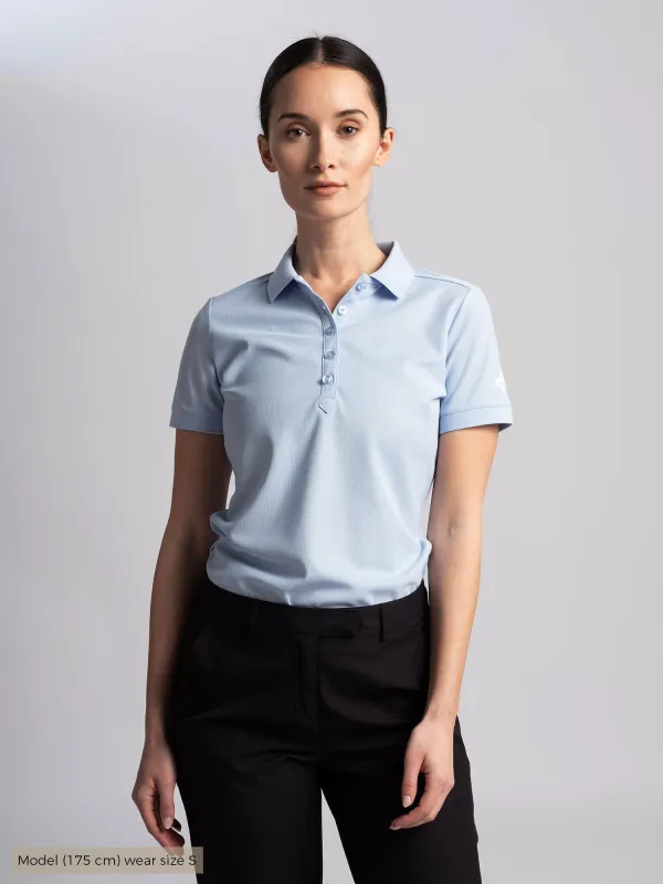 W AMY POLOSHIRT Chambray Blue sold by Cross Sportswear