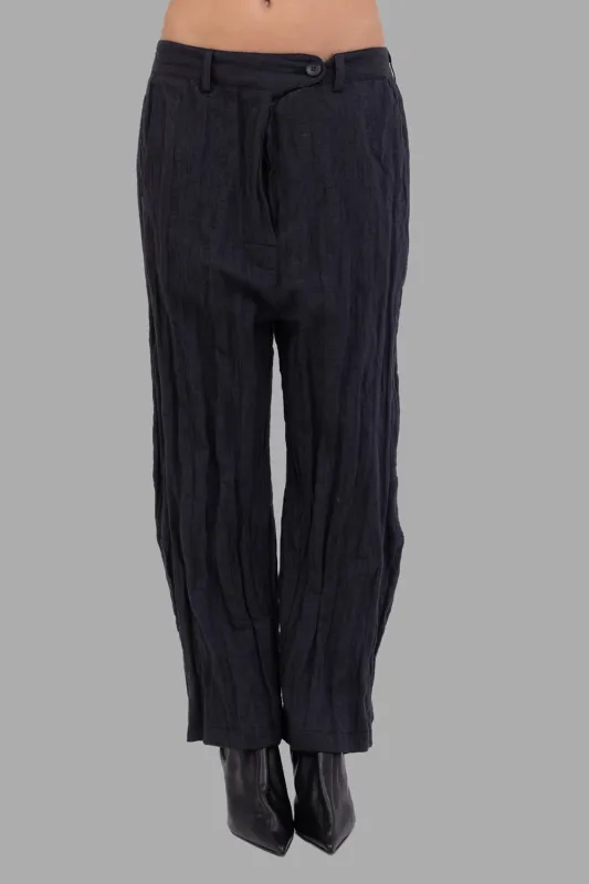 Crinkled Relaxed Wide-Leg Trousers in Black sold by Plus Zero Concept Store