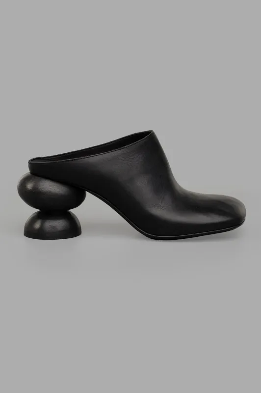 Stone Mules in Black sold by Plus Zero Concept Store