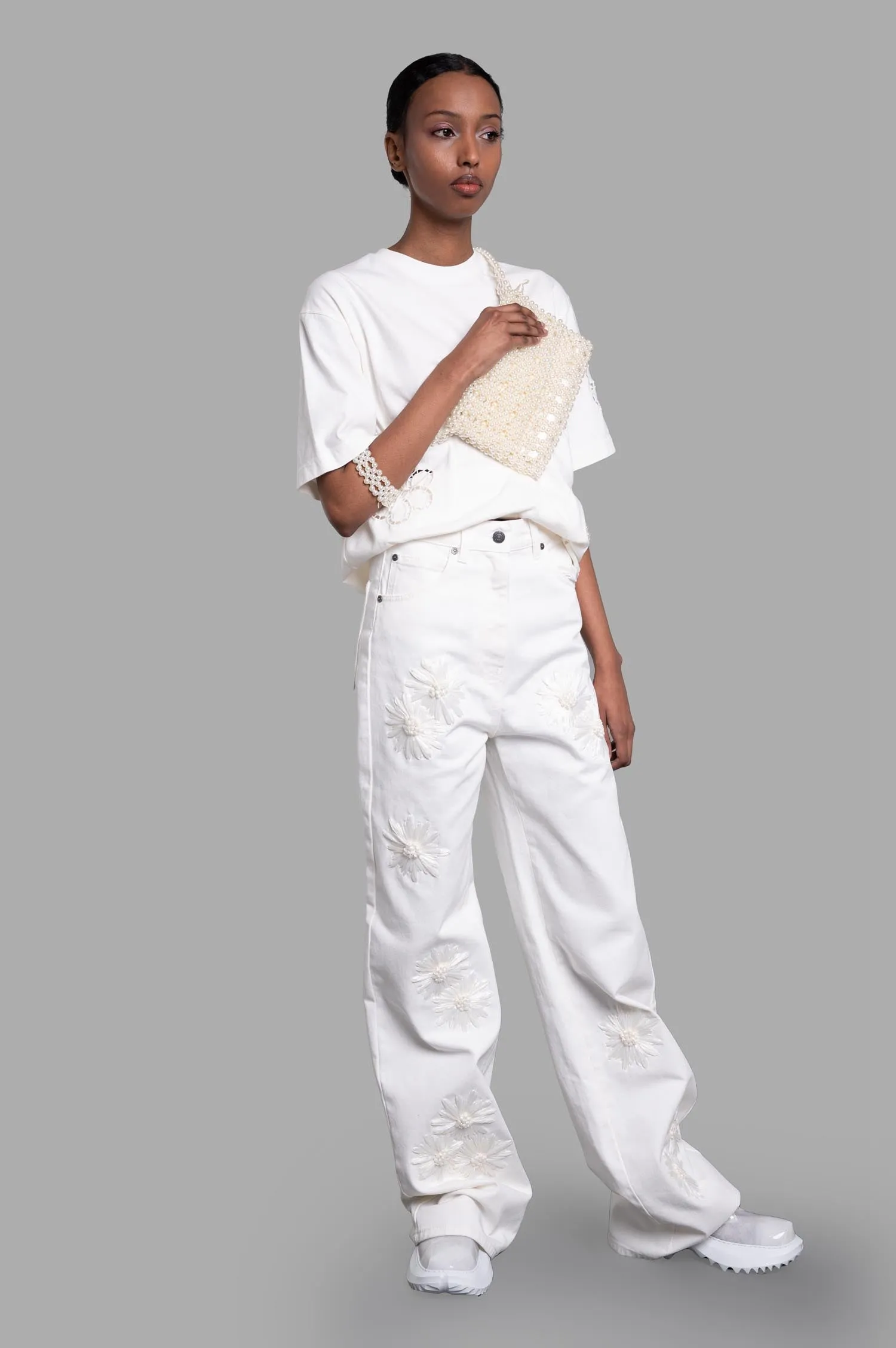 Denim Trousers with Raffia Flowers sold by Plus Zero Concept Store