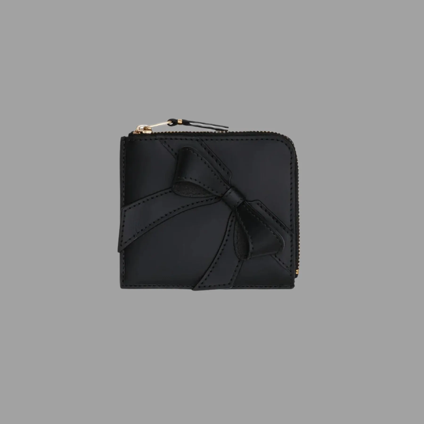 Half-zip Bow Wallet sold by Plus Zero Concept Store