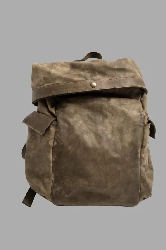 Rolltop leather backpack in dive khaki sold by Plus Zero Concept Store