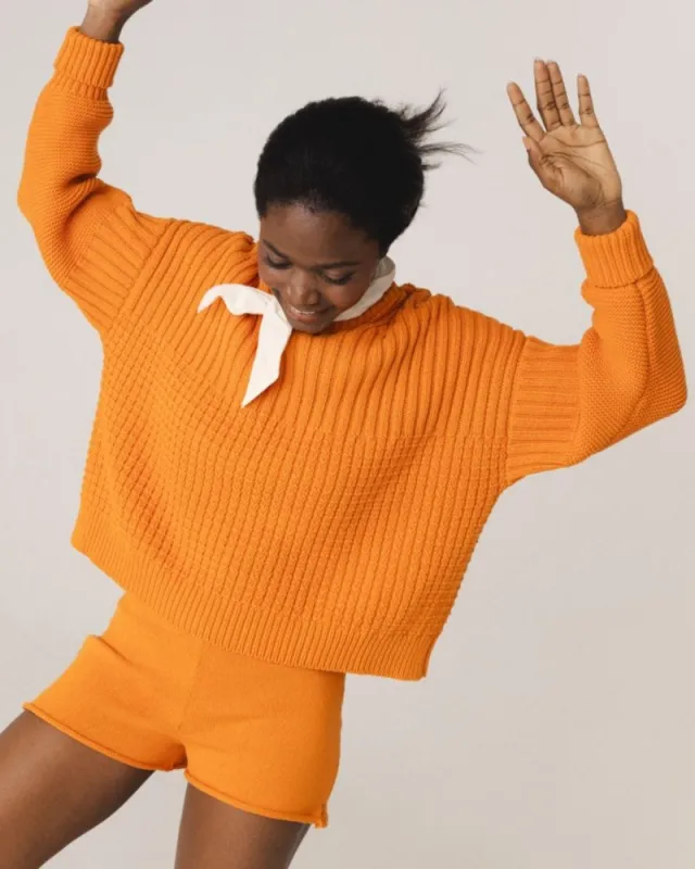 Delčia: Orange Cotton Sweater sold by The Knotty Ones