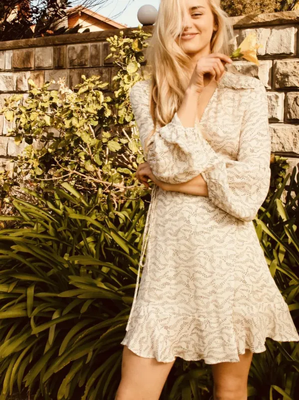 Margot Long Sleeve Short Wrap Dress sold by All the Wild Roses