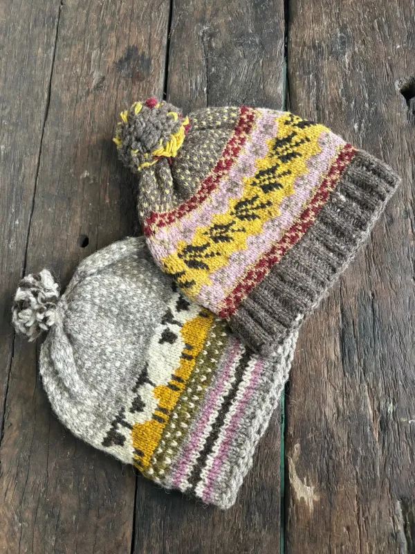 Handknitted Pompom Beanie sold by Anjelms