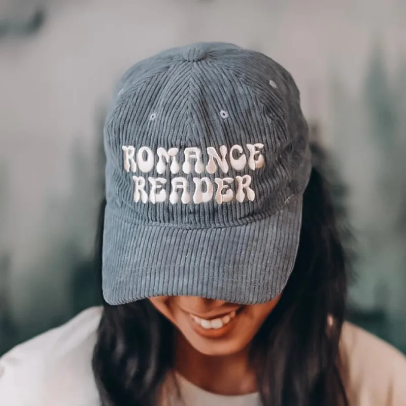 Embroidered Romance Reader Dad Hat sold by The Bookish Box