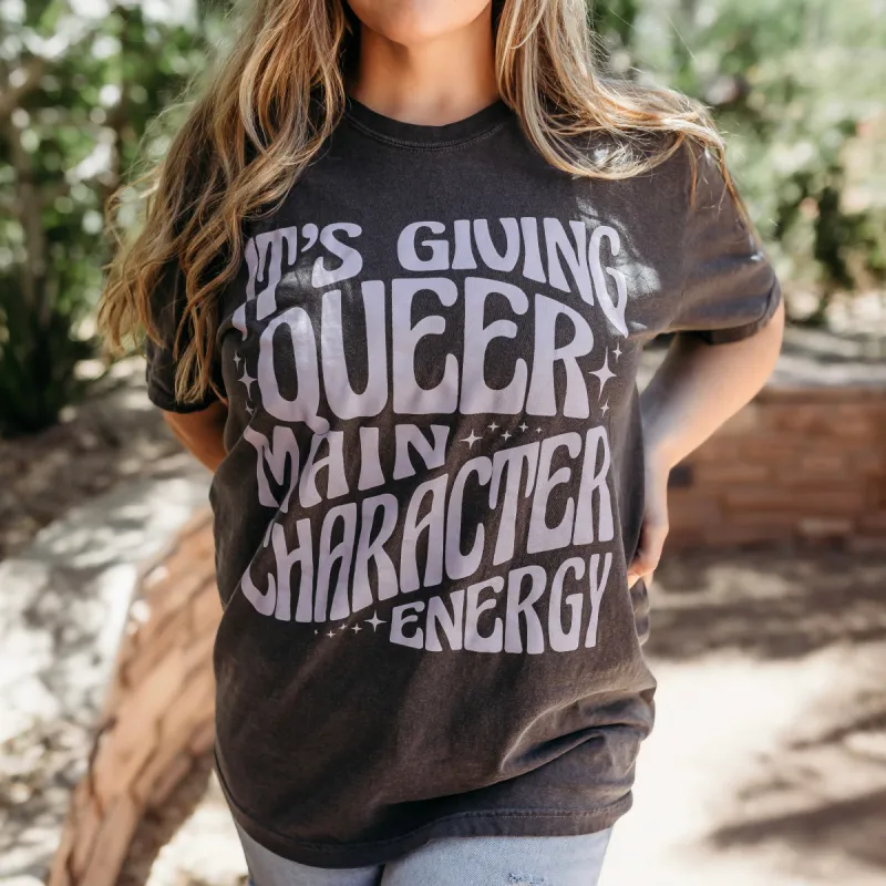 Queer Main Character Energy Heavy Weight Tee sold by The Bookish Box