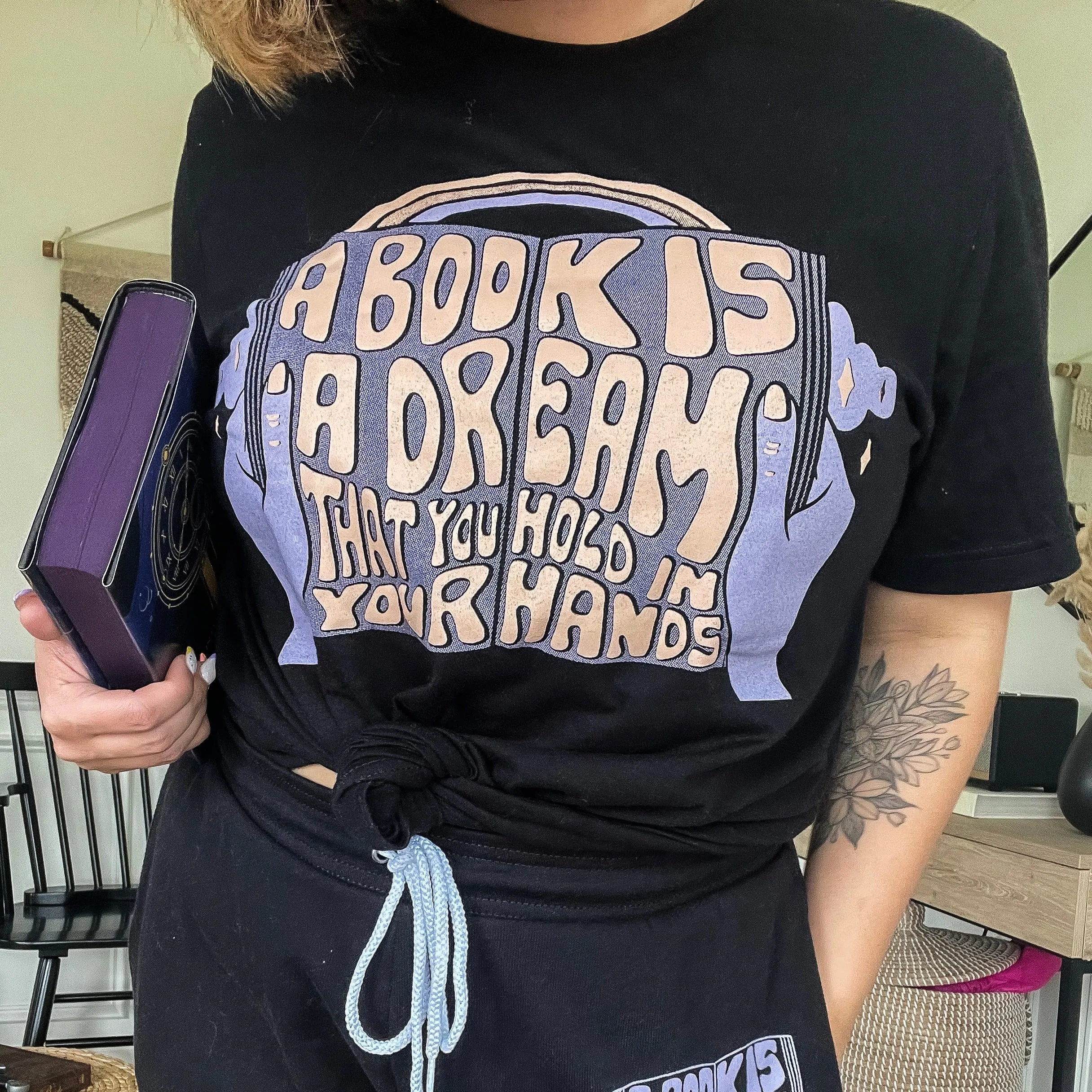 A Book is a Dream Tee sold by The Bookish Box
