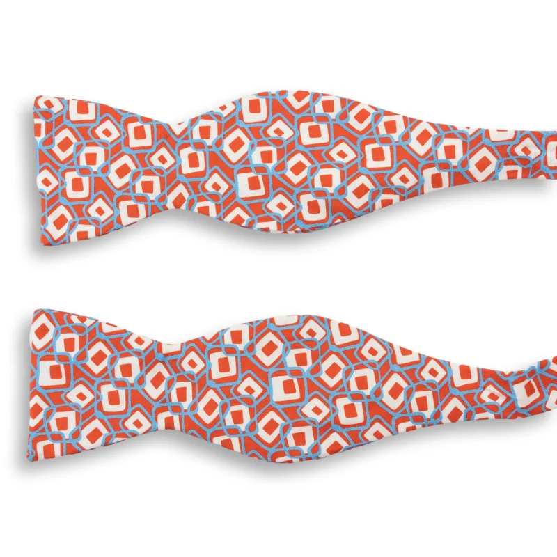 Orange, Sky Blue, and White Abstract Square Patterned Silk Bow Tie sold by The Andover Shop