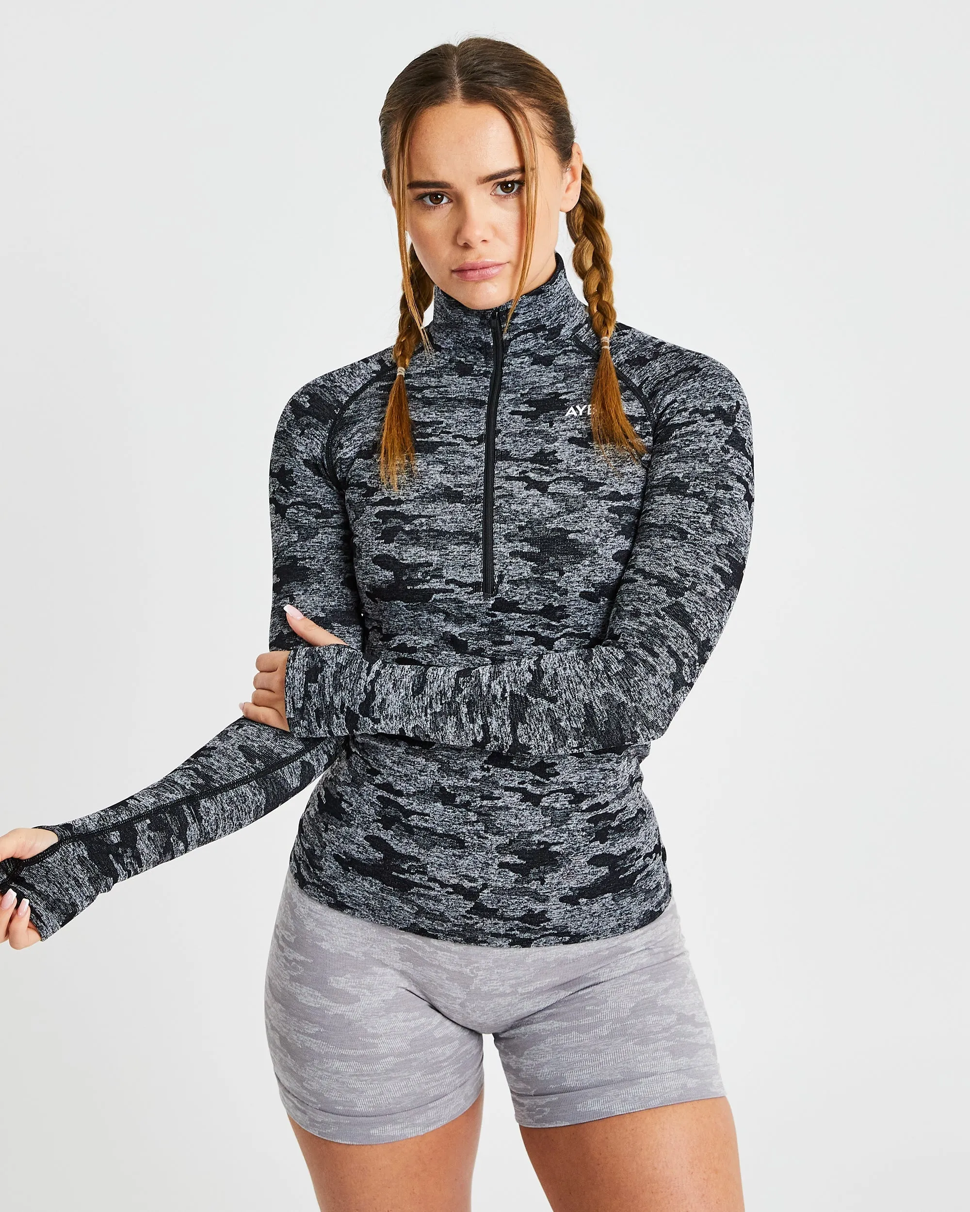 Evolve Camo Seamless 1/2 Zip Pullover - Black sold by AYBL