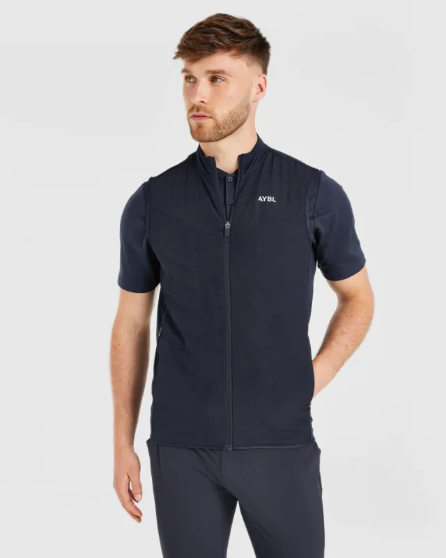 Performance Hybrid Gilet - Navy sold by AYBL