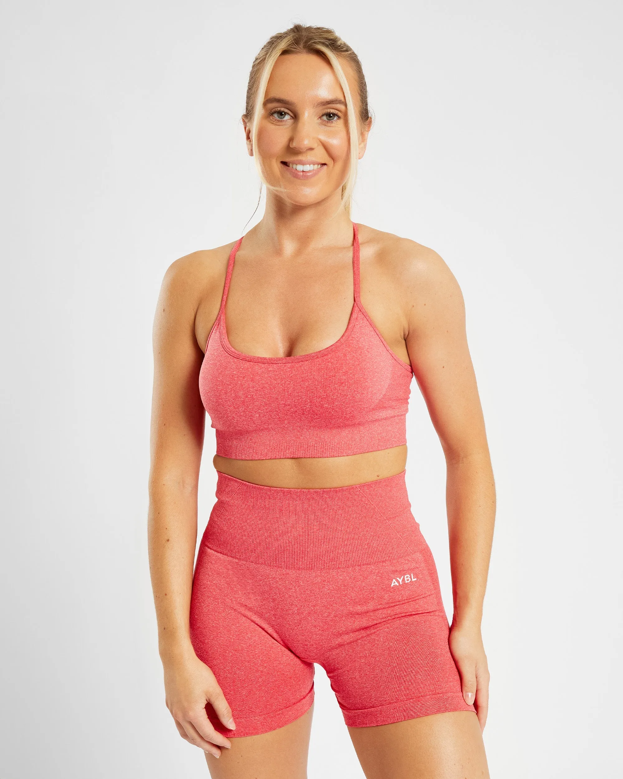 Empower Seamless Sports Bra - Coral Red Marl sold by AYBL