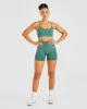 Empower Seamless Sports Bra - Forest Green Marl sold by AYBL