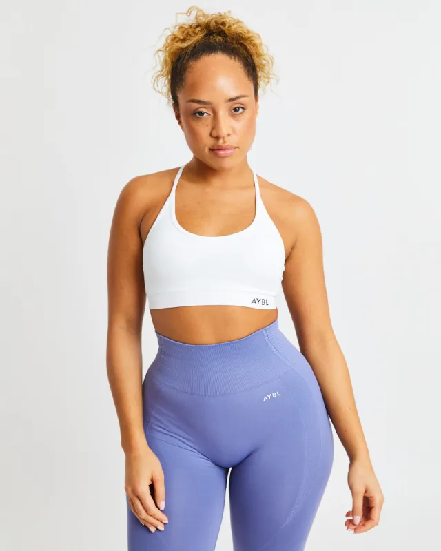 Essential Seamless V Neck Sports Bra - White sold by AYBL