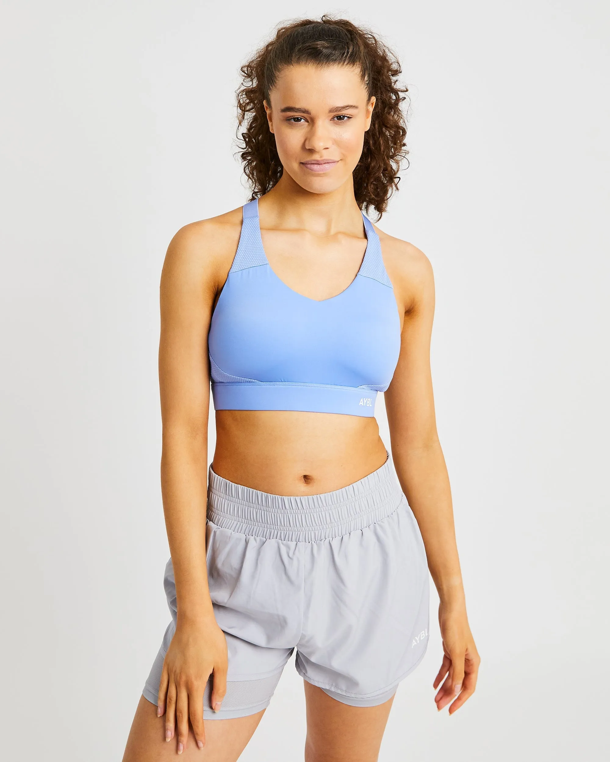 Sportive Open Back Sports Bra - Blue sold by AYBL