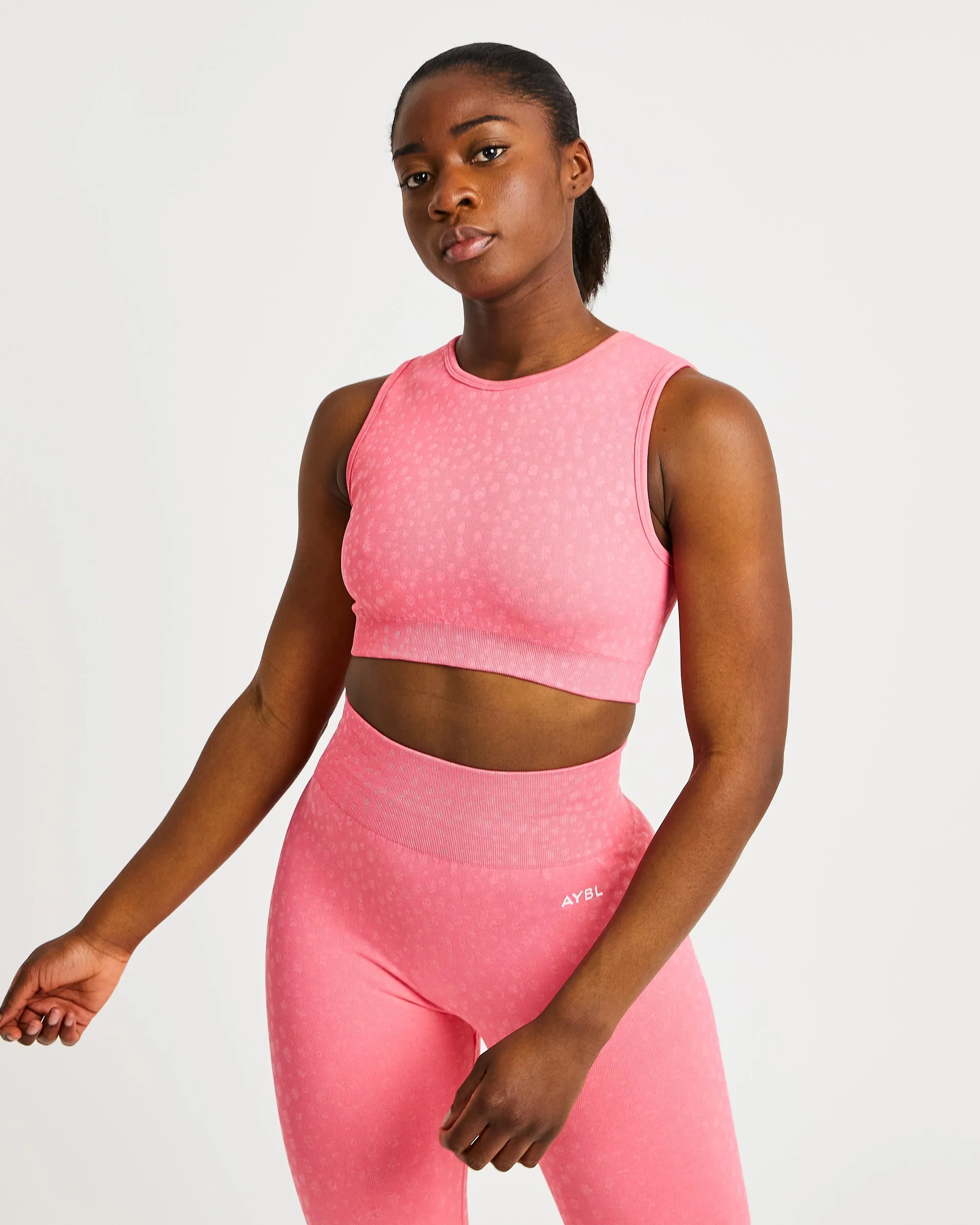 Evolve Speckle Seamless Crop Vest - Coral Pink sold by AYBL
