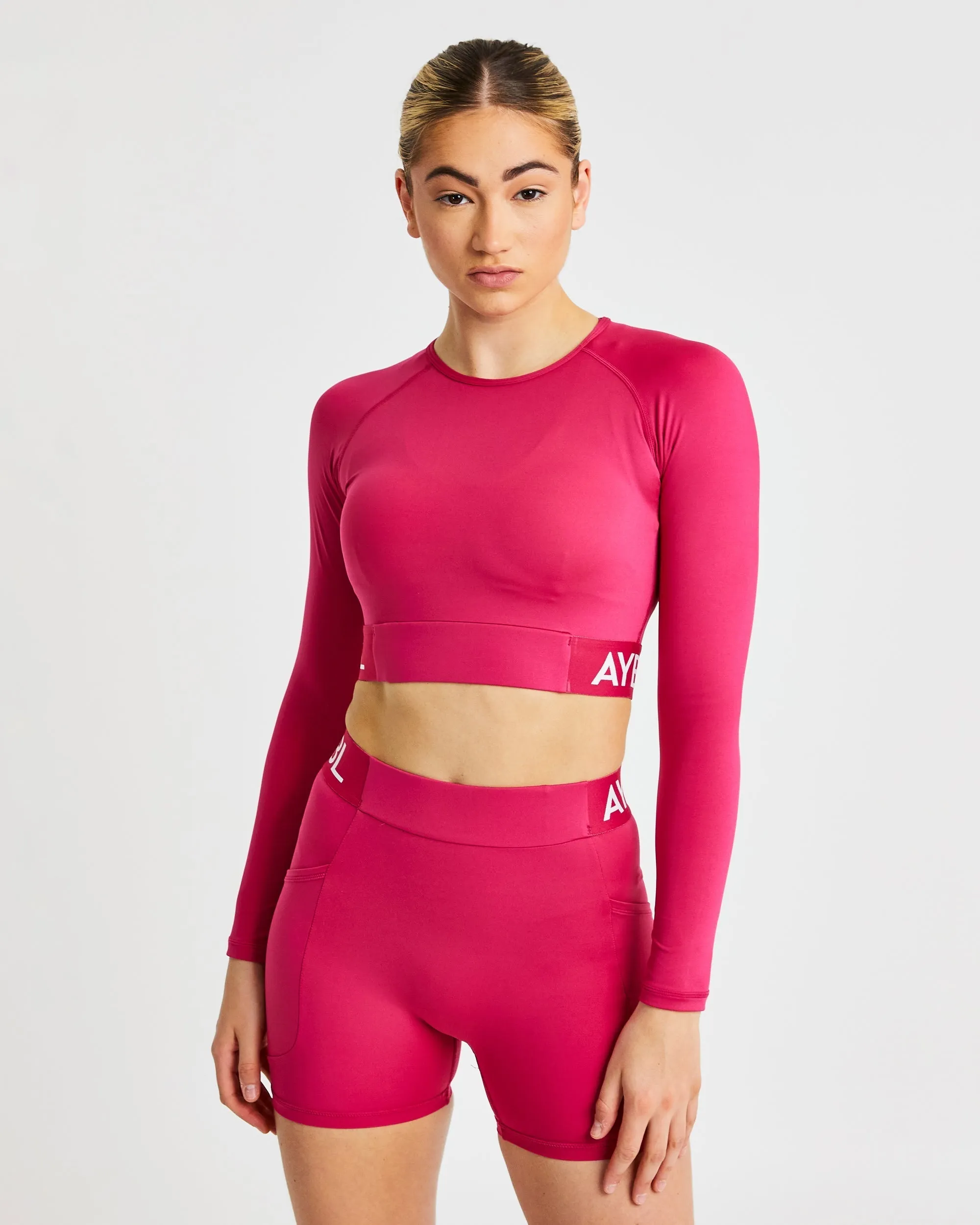 Training Long Sleeve Crop Top - Raspberry sold by AYBL