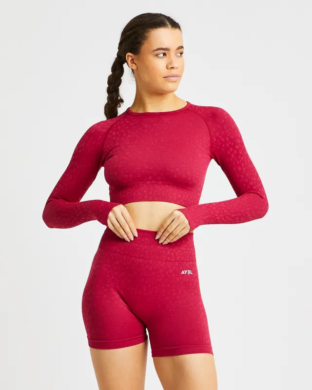 Evolve Speckle Seamless Long Sleeve Crop Top - Raspberry sold by AYBL