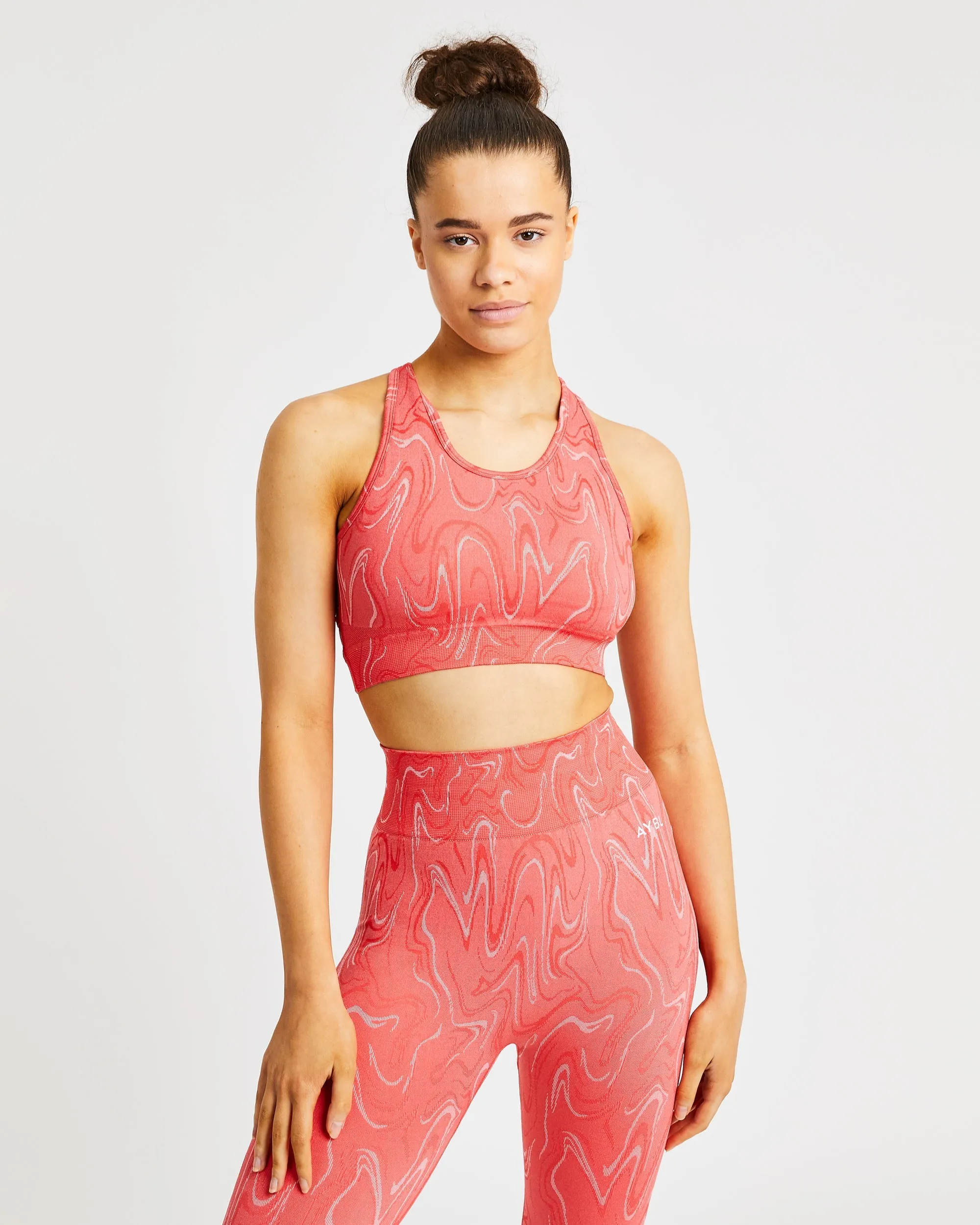 Velocity Seamless Sports Bra - Coral sold by AYBL