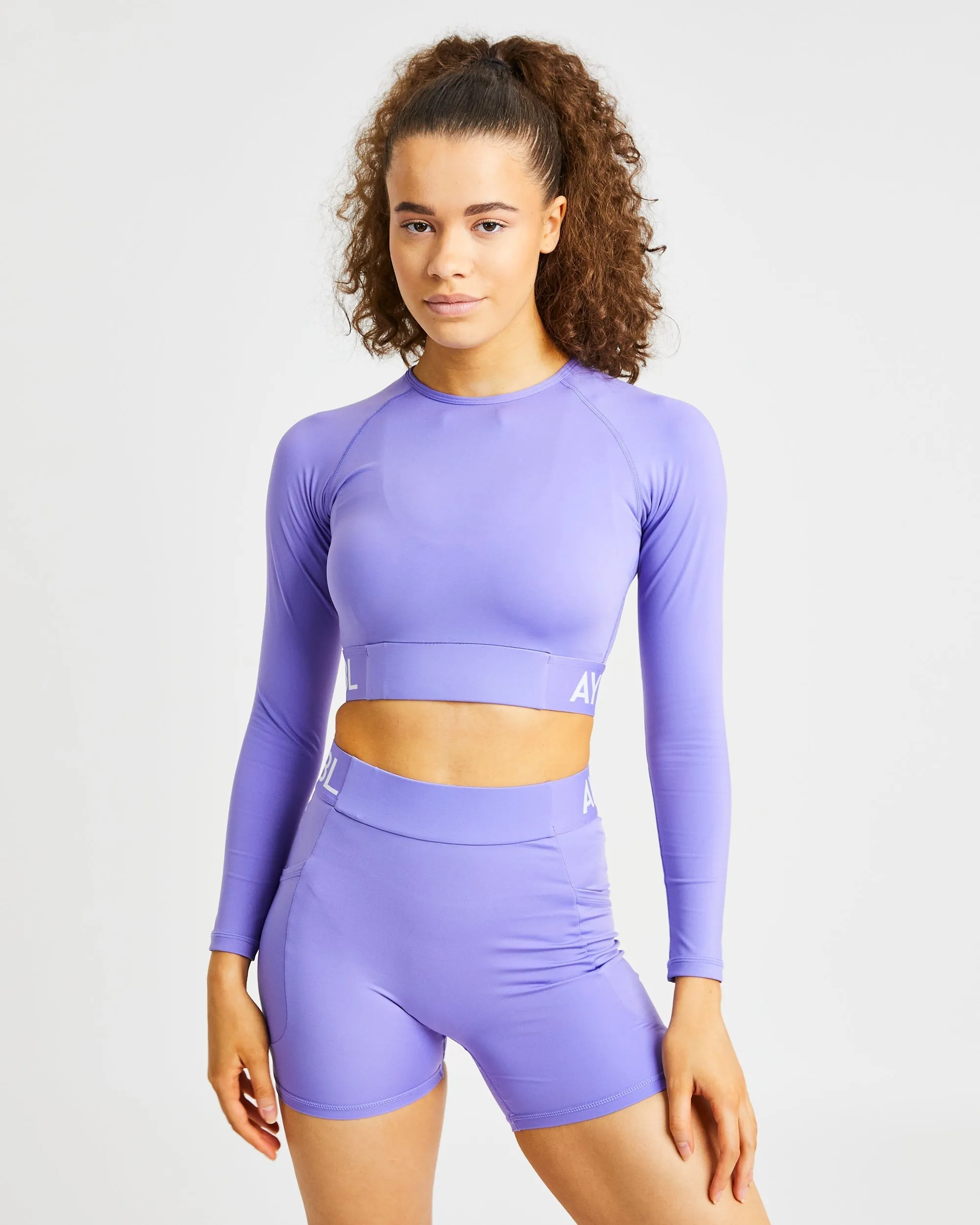 Training Long Sleeve Crop Top - Purple sold by AYBL