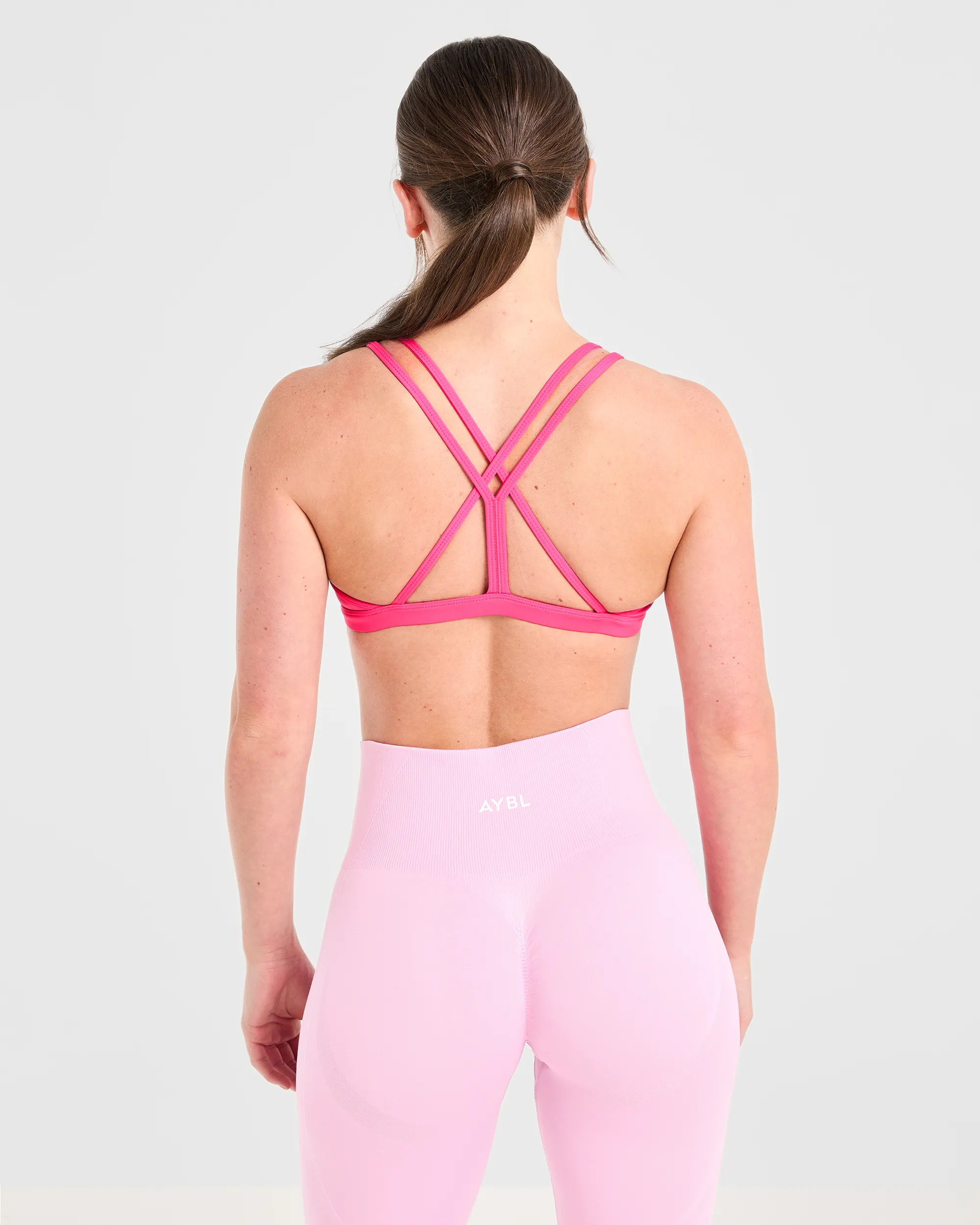 Essential Strappy Sports Bra - Hot Pink sold by AYBL product image thumbnail 2