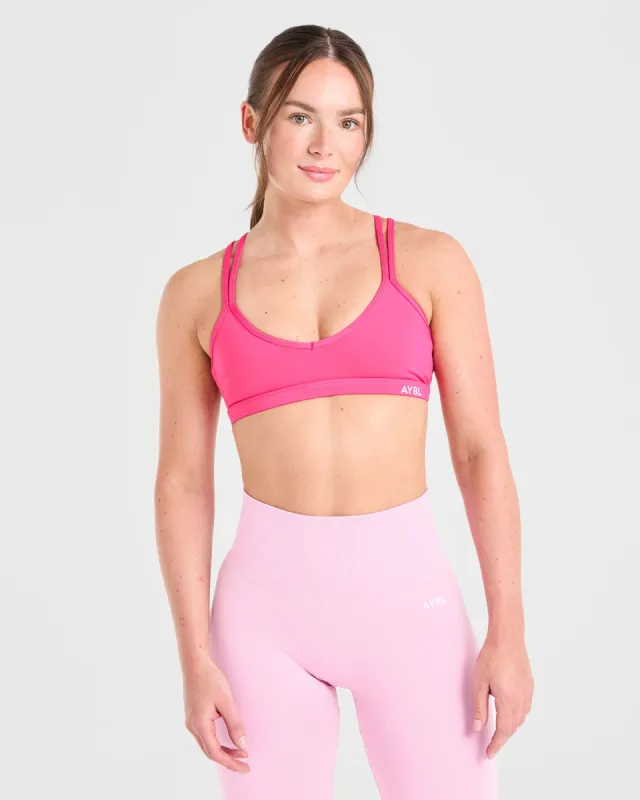 Essential Strappy Sports Bra - Hot Pink sold by AYBL