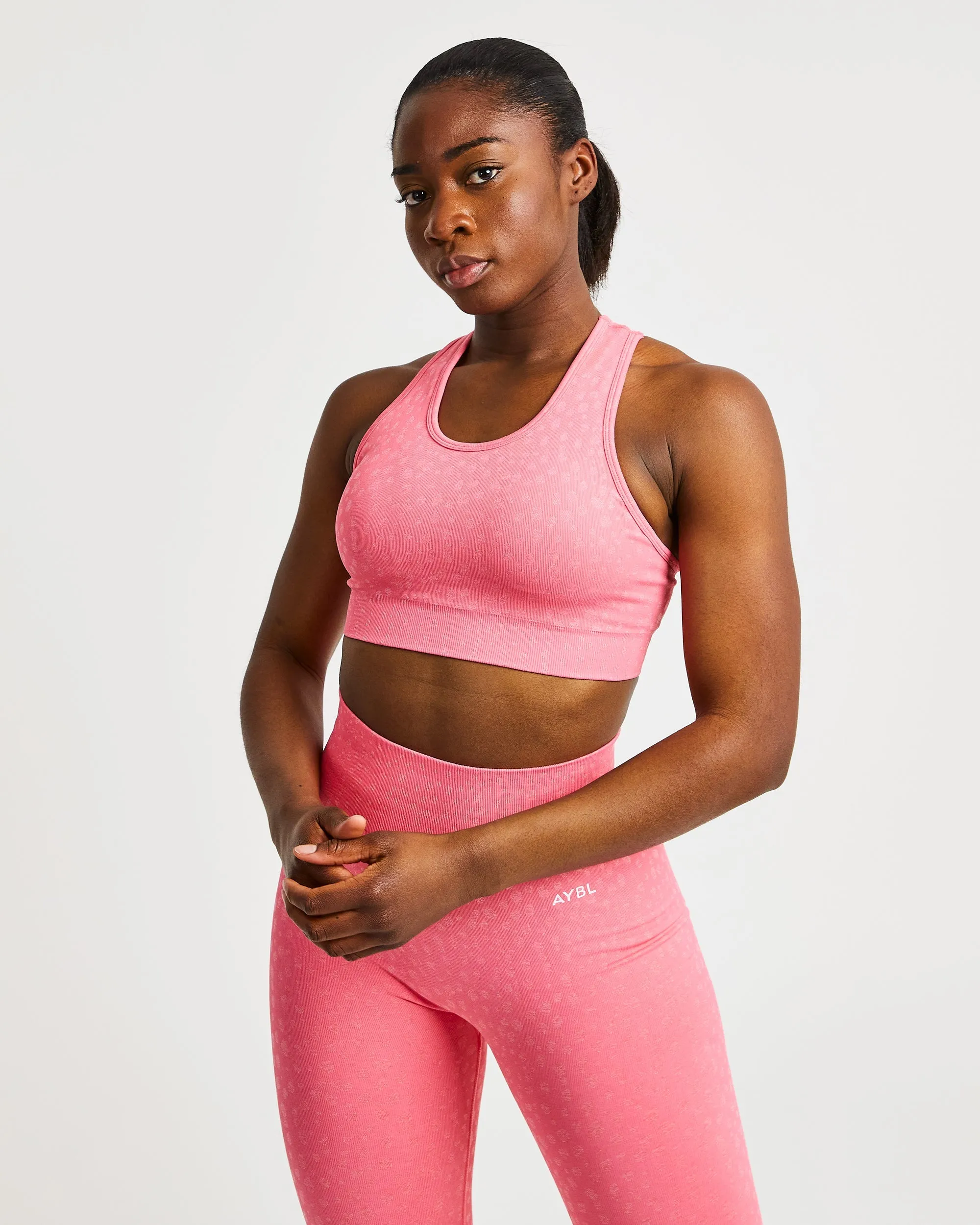 Evolve Speckle Seamless Sports Bra - Coral Pink sold by AYBL