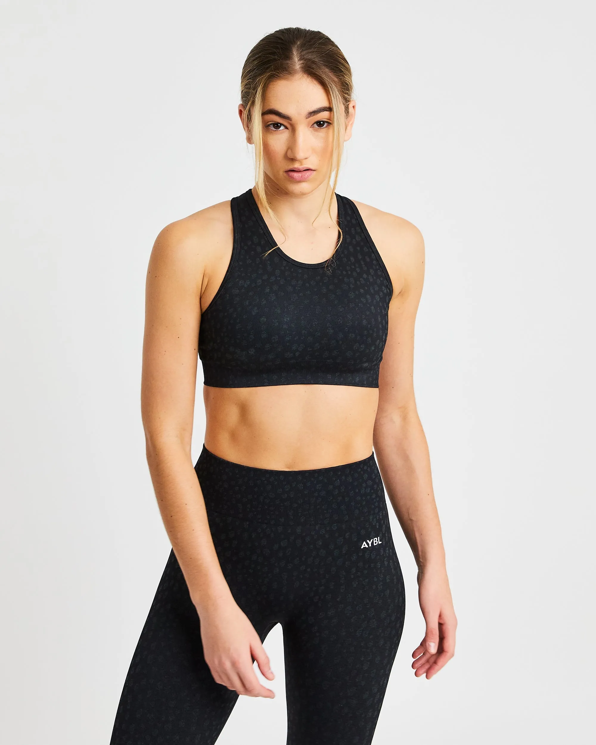 Evolve Speckle Seamless Sports Bra - Black sold by AYBL