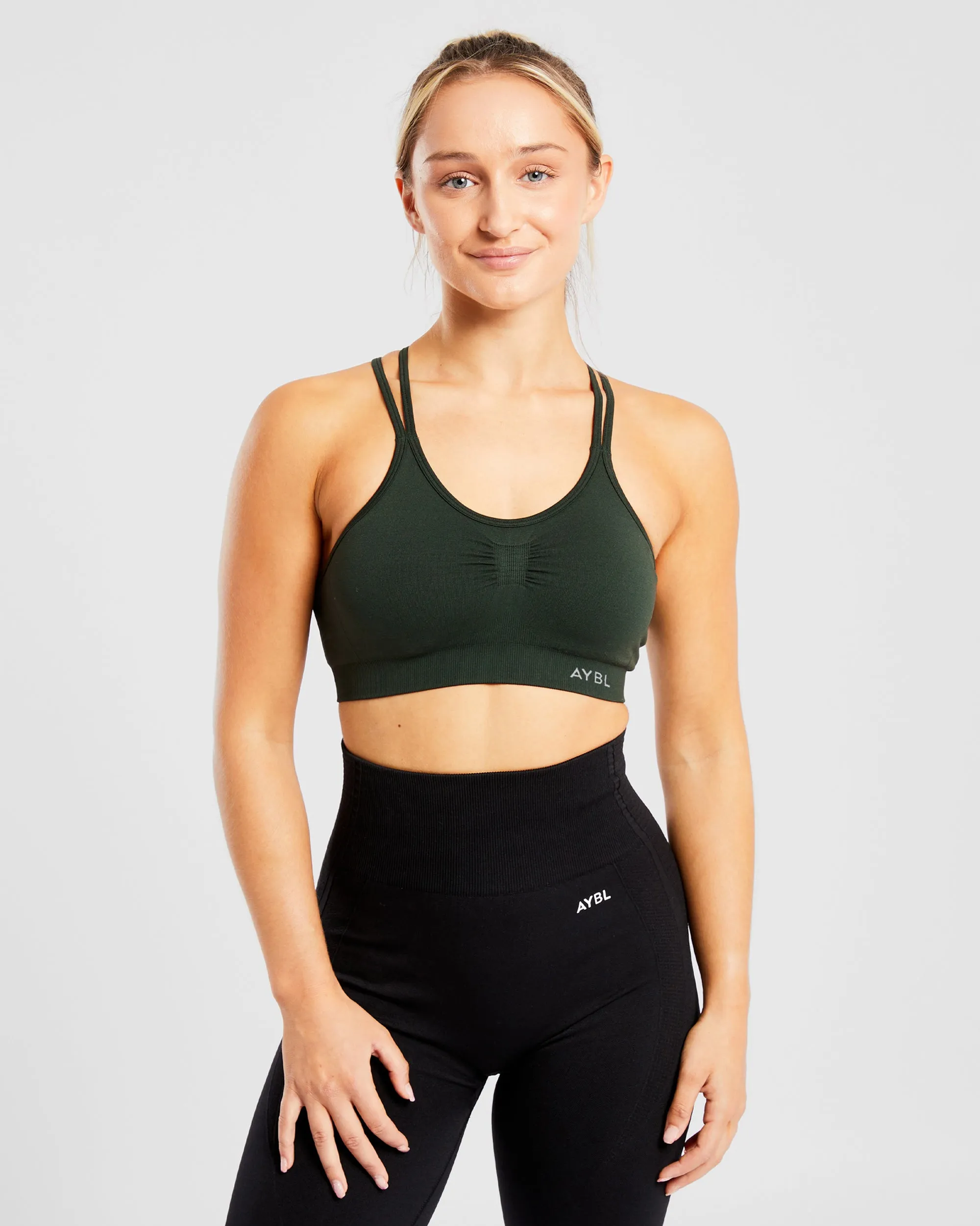 Essential Seamless Ruched Sports Bra - Dark Forest sold by AYBL