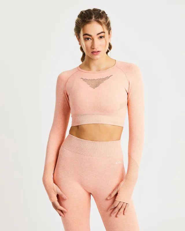 Motion Seamless Long Sleeve Crop Top - Peach Marl sold by AYBL