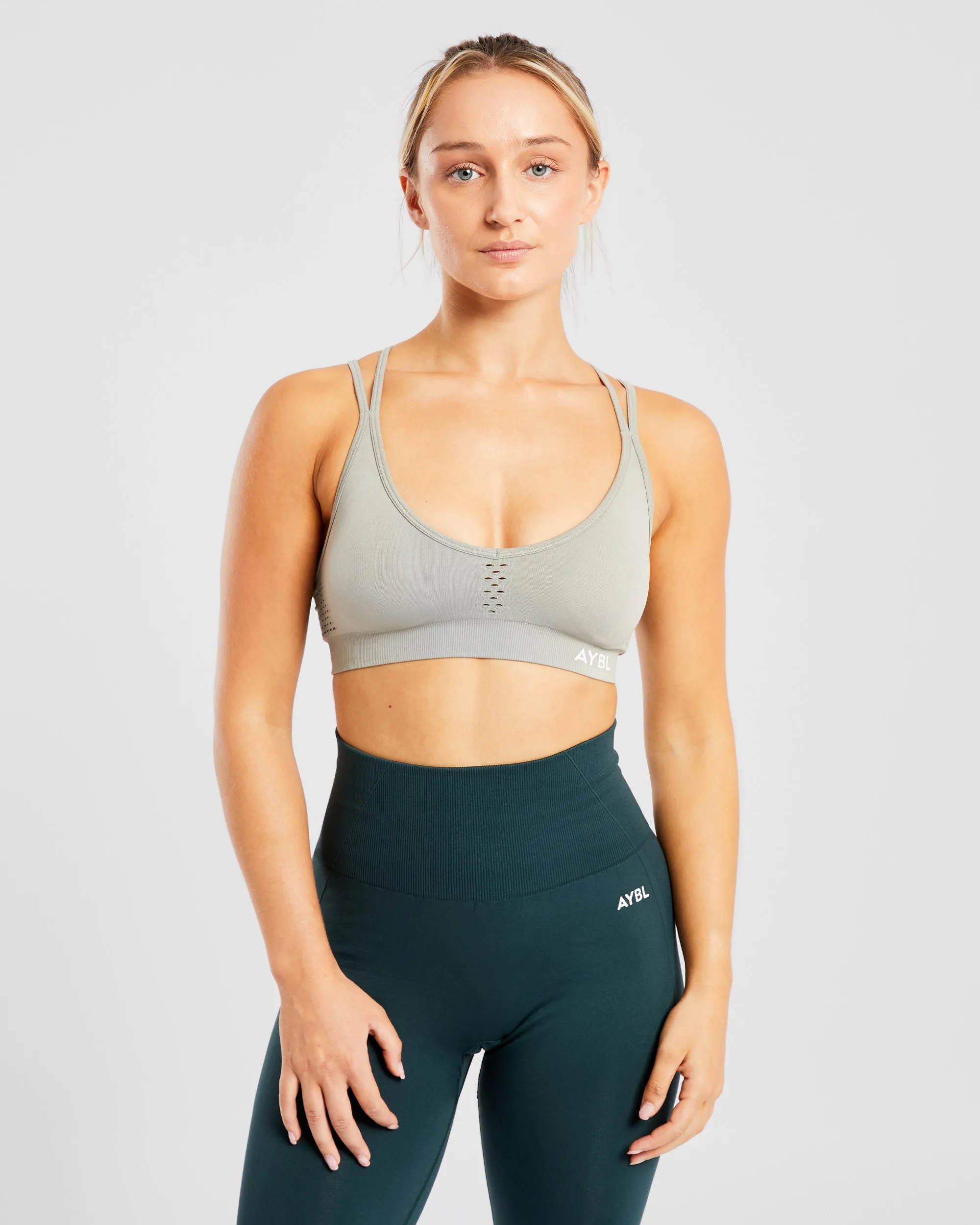 Essential Seamless Strappy Sports Bra - Muted Olive sold by AYBL