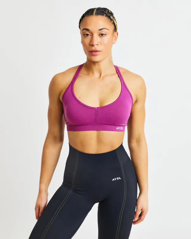 Essential Seamless Strappy Sports Bra - Magenta sold by AYBL