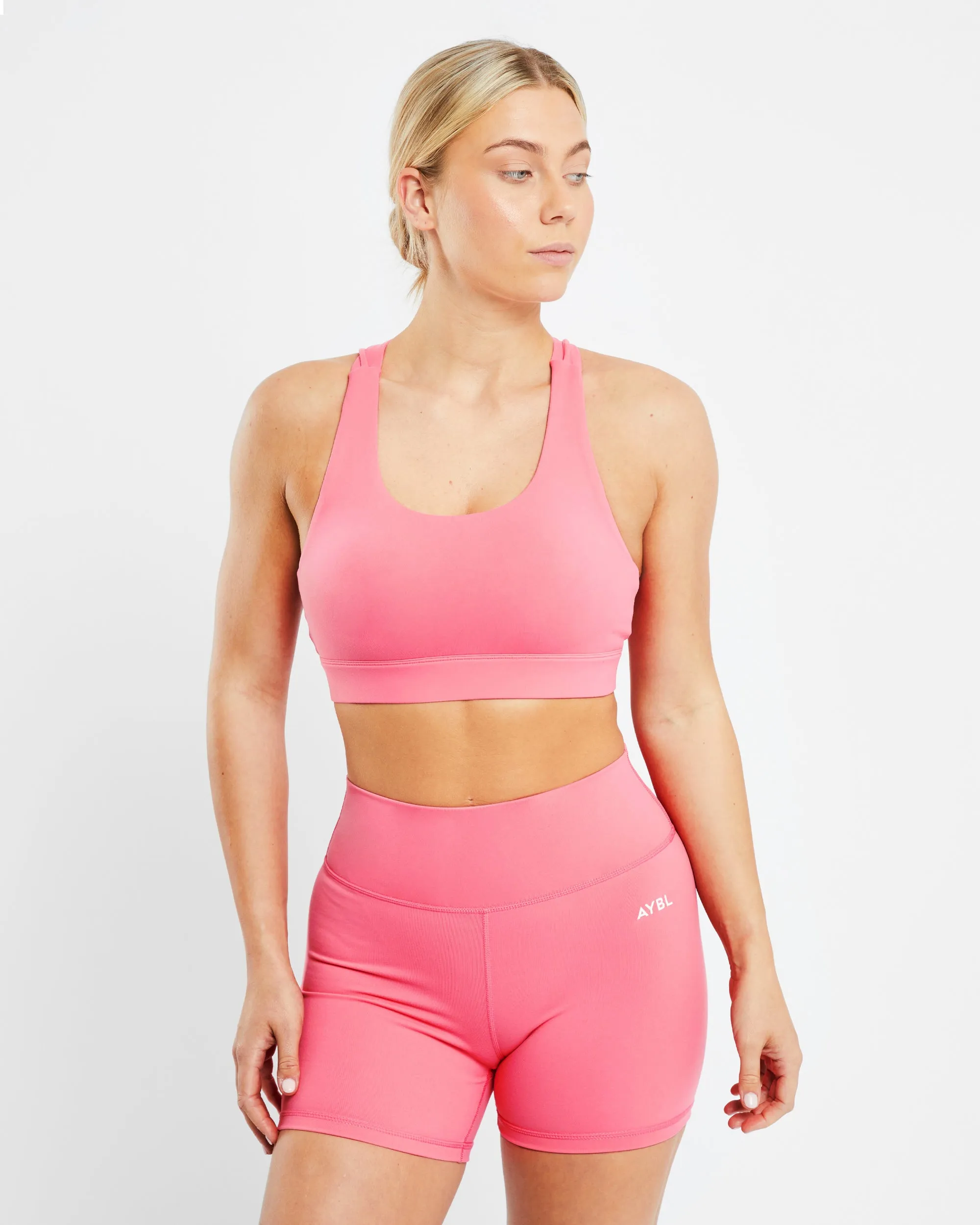 Core Sports Bra - Coral Pink sold by AYBL