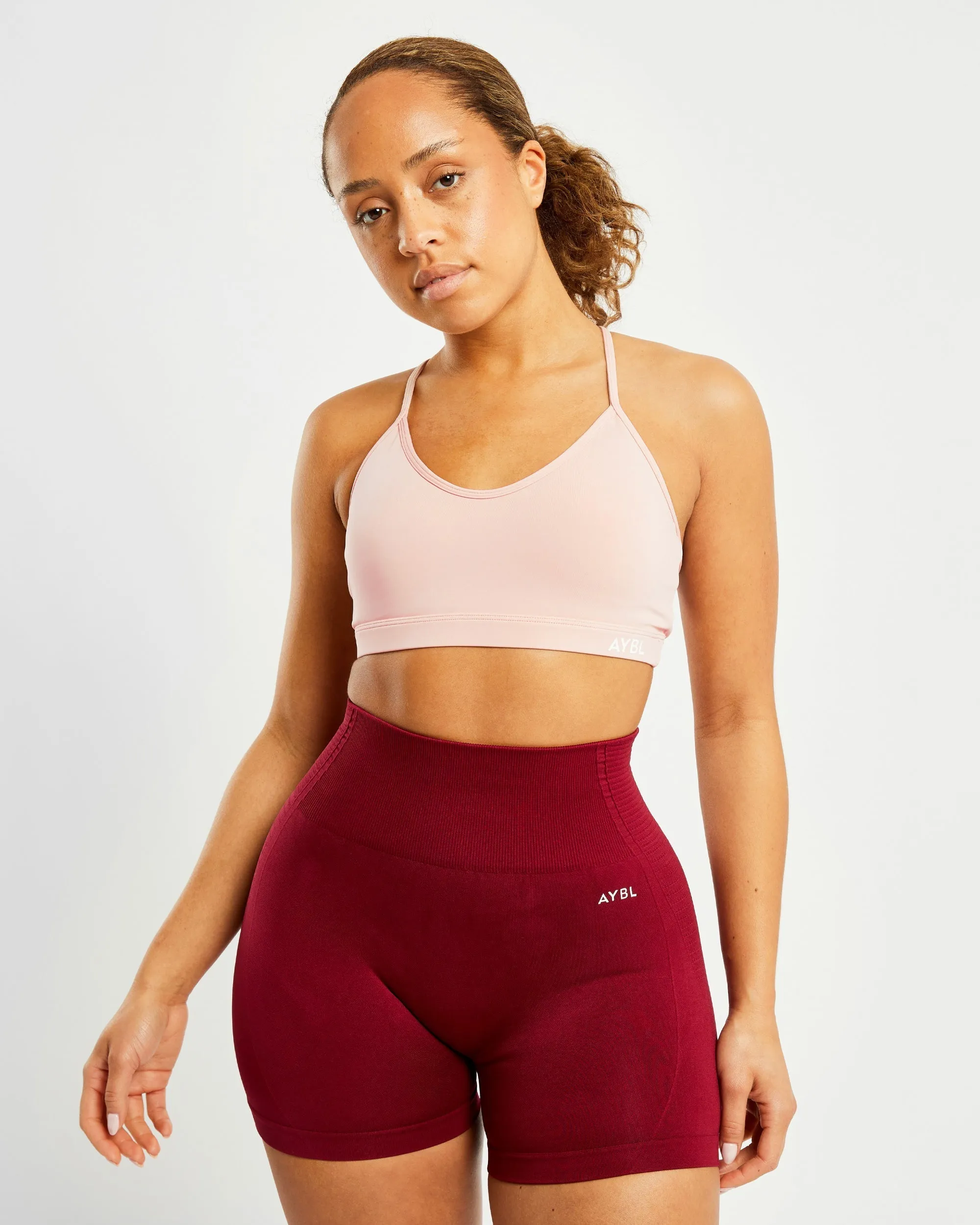 Essential V Neck Sports Bra - Dusty Pink sold by AYBL