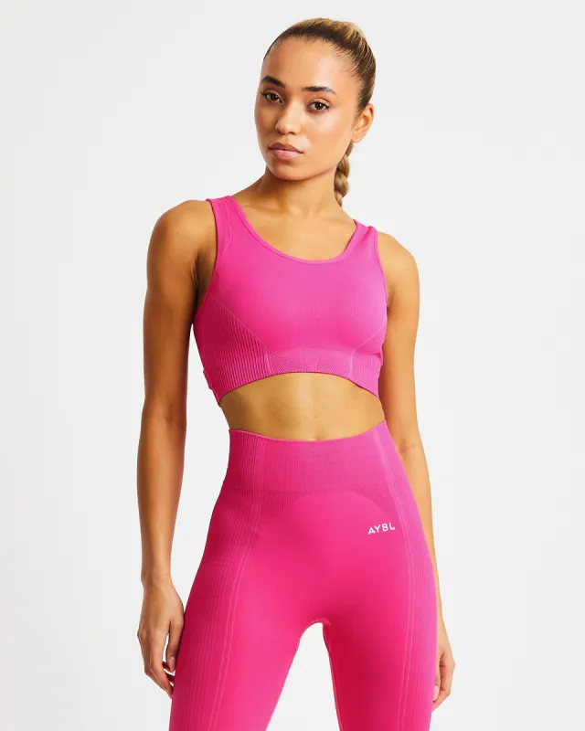 Reflex Seamless Sports Bra - Fuchsia Pink sold by AYBL