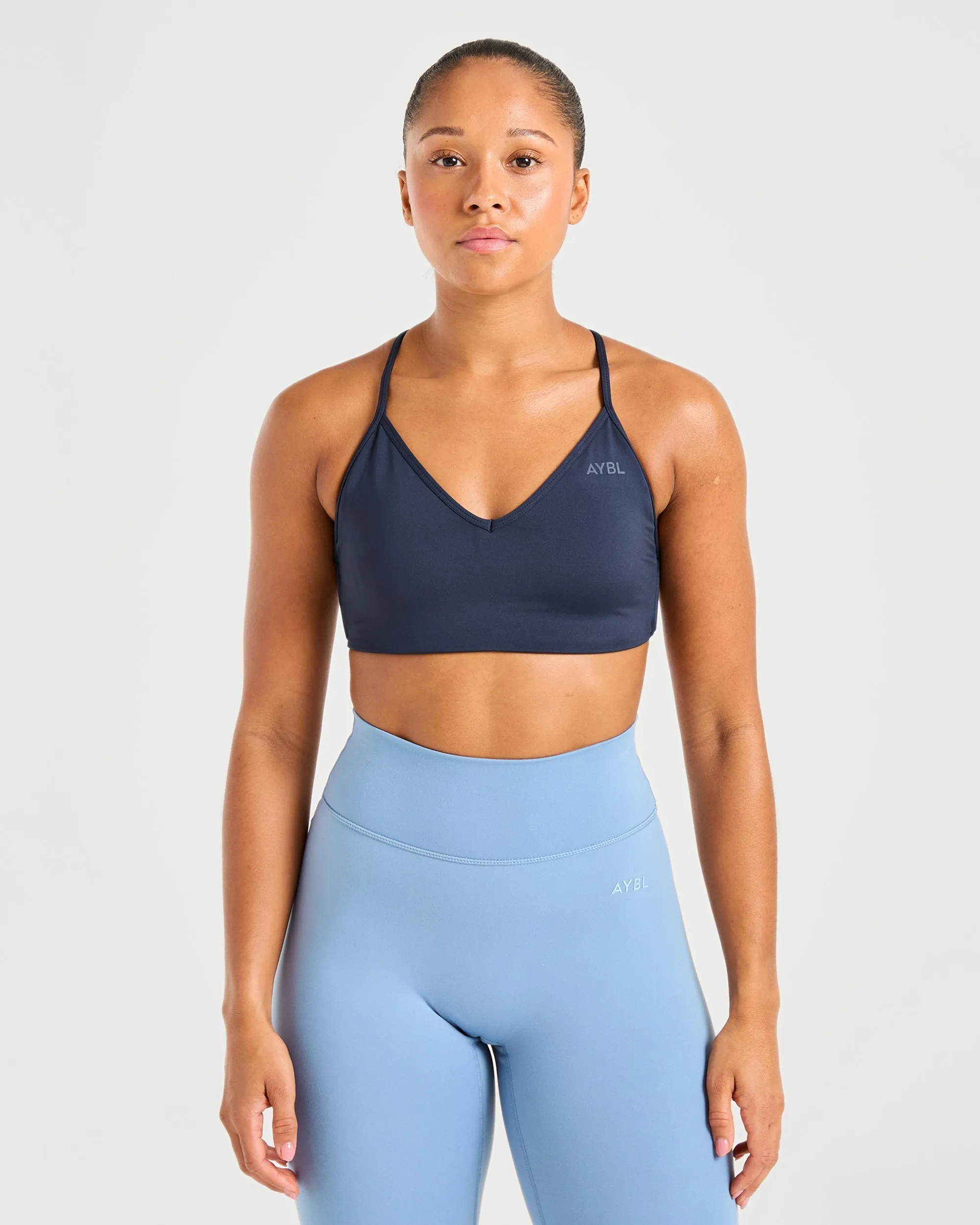 Essential Crossback Sports Bra - Deep Navy sold by AYBL