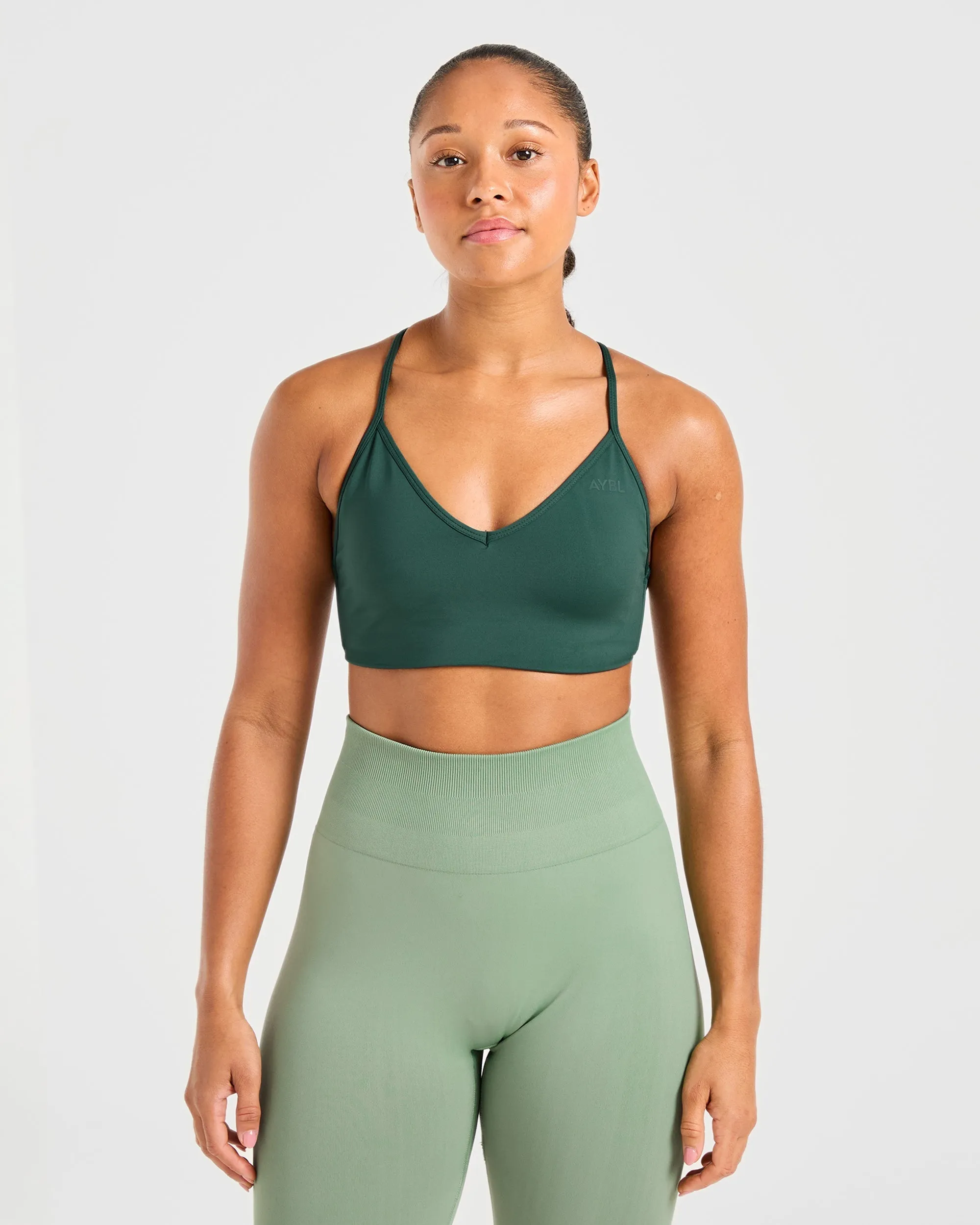 Essential Crossback Sports Bra - Deep Green sold by AYBL